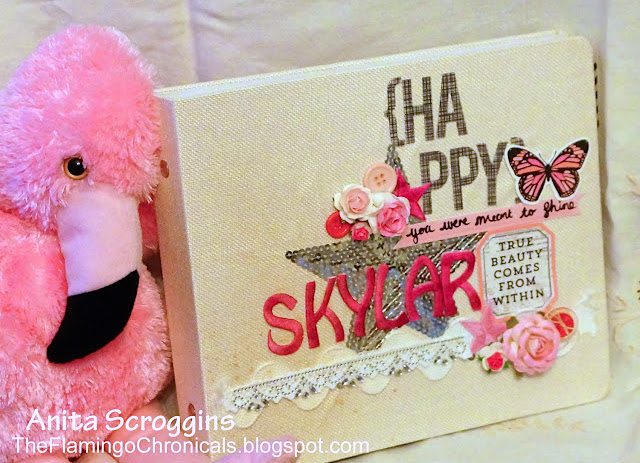 joy embroidered letters on photo album