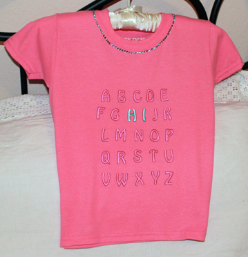 joy embroidered iron-on letters child tee shirt