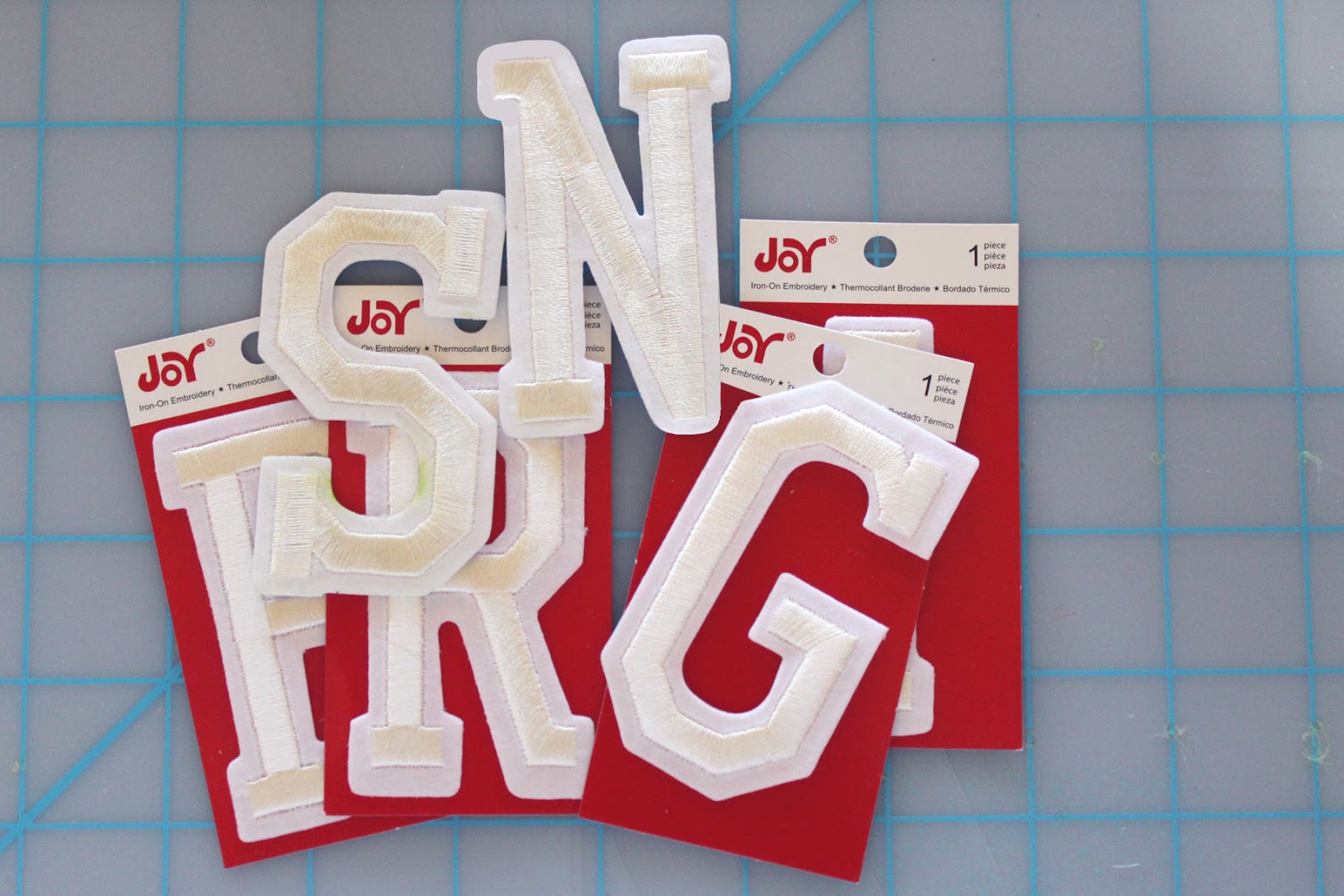 Joy embroidered iron-on letters